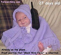 Abby - 27 days old and on the PHONE